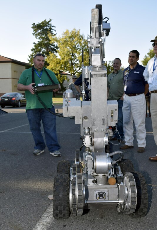 Roman Lara, Rackspace Hosting senior security engineer, controls a F6A explosive ordnance robot during a demonstration by the 2nd Civil Engineer Squadron EOD flight Oct. 27, 2016 at Barksdale Air Force Base, Louisiana. The demonstration was part of a two-day civic leader tour sponsored by the 433rd Airlift Wing and hosted by the 307th Bomb Wing. (U.S. Air Force photo by Tech. Sgt. Lindsey Maurice)  