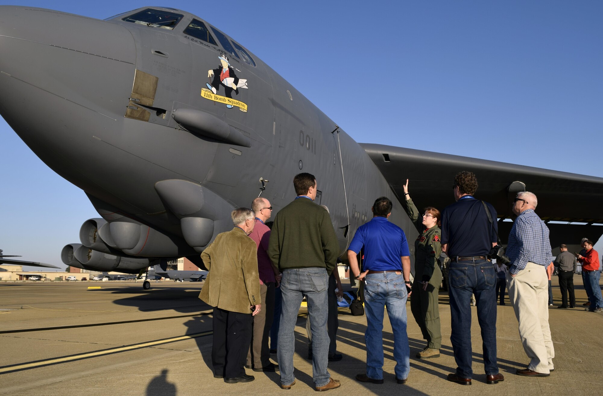 First Lt. Cynthia Ryan, middle, 11th Bomb Squadron B-52 Stratofortress navigator, explains the intricacies of the B-52 to Texas civic leaders Oct. 28, 2016 at Barksdale Air Force Base, Louisiana. The aircraft tour was part of a two-day civic leader visit sponsored by the 433rd Airlift Wing and hosted by the 307th Bomb Wing. (U.S. Air Force photo by Tech. Sgt. Lindsey Maurice)  
