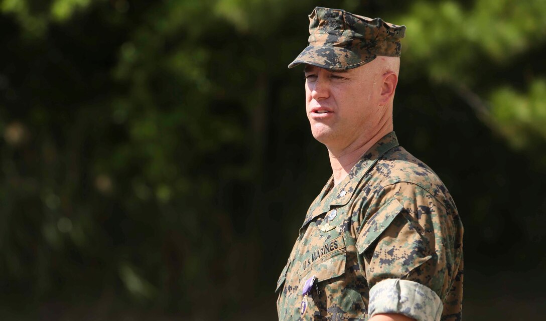 Lt. Col. Robert C. Sellers, 3rd Marine Expeditionary Brigade Assistant Chief of Staff G-4, addresses friends and family at his Purple Heart award ceremony in front of Secher Hall on Camp Hansen, Okinawa, Japan, October 28, 2016. The ceremony was held in front of Secher Hall to remind those in attendance to remember the fallen. Sellers is from Belvidere, Illinois.