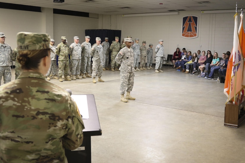 Col. Nikki Olive-Griffin (left), deputy commanding general of sustainment, 335th Signal Command (Theater) addresses nearly 70 Army Reserve Soldiers from Detachment 4, 335th SC (T) during a deployment ceremony at the unit headquarters Oct. 30 for nearly 70 Army Reserve Soldiers who are preparing to deploy to Southwest Asia in support of Operation Inherent Resolve.  (Photo by Sgt. 1st Class Brent C. Powell)