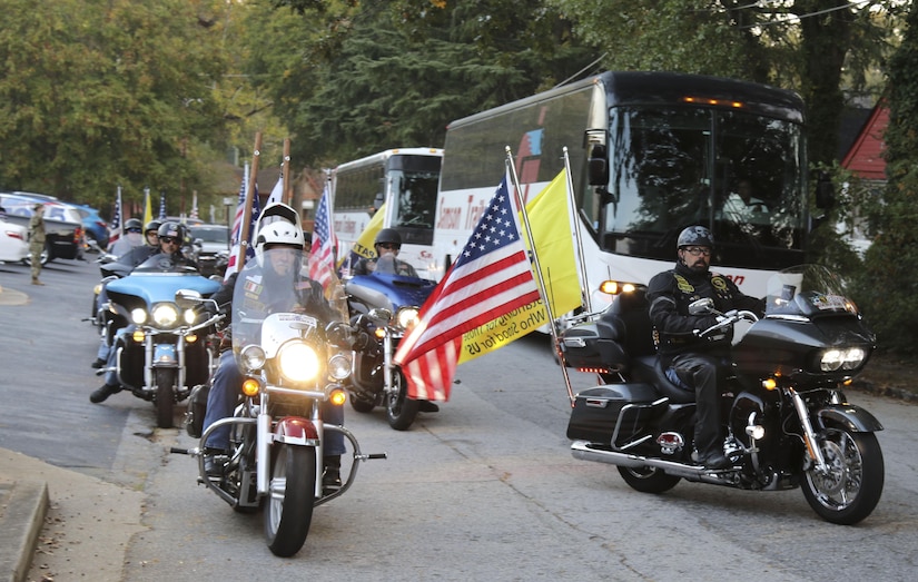 A group of Patriot Guard Riders, a military support group, prepare to escort nearly 70 Army Reserve Soldiers from Detachment 4, 335th Signal Command (Theater) from the unit headquarters in East Point, Georgia to the airport following a deployment ceremony Oct. 30.  The Soldiers will be deploying to Southwest Asia in support of Operation Inherent Resolve.  (Photo by Sgt. 1st Class Brent C. Powell)