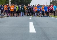 Participants in the 5th annual 374th Civil Engineer Squadron Running of the Bulls 10K wait for the race to start on 28 Oct. 2016, Yokota Air Base, Japan. The event had over 75 participants and raised $760 for charity. (U.S. Air Force photo by Airman 1st Class Donald Hudson/Released)
