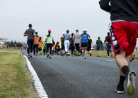 Participants run in the 5th annual 374th Civil Engineer Squadron Running of the Bulls 10K on 28 Oct. 2016, Yokota Air Base, Japan. The event had over 75 participants and raised $760 for charity. (U.S. Air Force photo by Airman 1st Class Donald Hudson/Released)