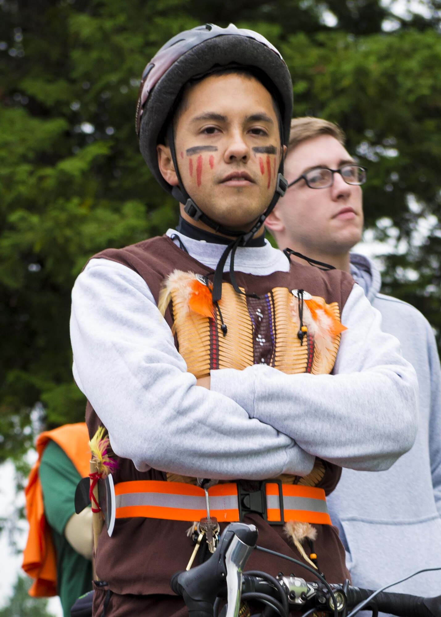 A volunteer for the 5th annual 374th Civil Engineer Squadron Running of the Bulls 10K poses for photo on 28 Oct. 2016, at Yokota Air Base, Japan. Event volunteers ensured participants safety by directing traffic and participants along the course, and operating a mobile hydration station. (U.S. Air Force photo by Airman 1st Class Donald Hudson/Released)