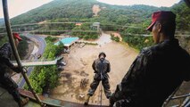 Republic of Korea Marines assist U.S. Marines with Combat Logistics 3, 3d Marine Logistics Group, III Marine Expeditionary Force, down a rappel tower during Winter Workhorse 16 at the Mountain Warfare Training Center in Pohang, Republic of Korea, October 10, 2016. One of the goals of Winter Workhorse is to refine 3rd Marine Logistics Group's combat skills in order to focus on combat readiness. Strengthening partnerships with regional allies, and enhancing response capabilities, helps maintain peace and regional security.