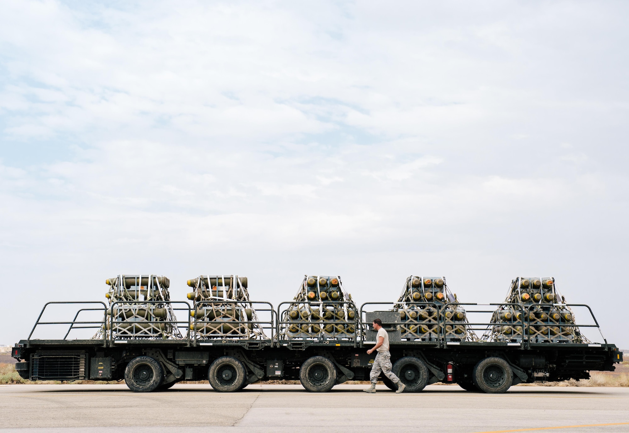 An Airman with the 332nd Expeditionary Logistics Readiness Squadron inspects pallets of unloaded cargo in support of Combined Joint Task Force - Operation Inherent Resolve, Oct. 28, 2016. The 332nd ELRS plans, supplies and distributes worldwide expeditionary combat support throughout the U.S. Air Forces Central Command area of operations. (U.S. Air Force photo by Senior Airman Jordan Castelan)