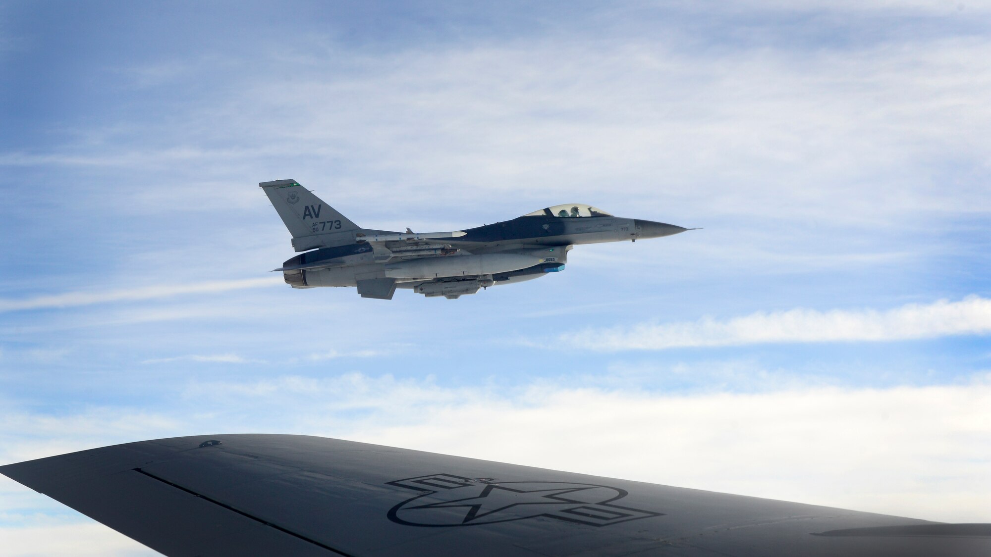 An F-16 Fighting Falcon assigned to the 555th Fighter Squadron, flies alongside a KC-135 Stratotanker over the Adriatic Sea during a training flight, Oct. 25, 2016. The 555th and 510th Fighter Squadrons fly more than 20,000 hours a year combined to ensure they can provide combat airpower on demand to U.S. and NATO Combatant Commanders and the National Command Authority to meet national security objectives. (U.S. Air Force photo by Senior Airman Areca T. Bell/Released)