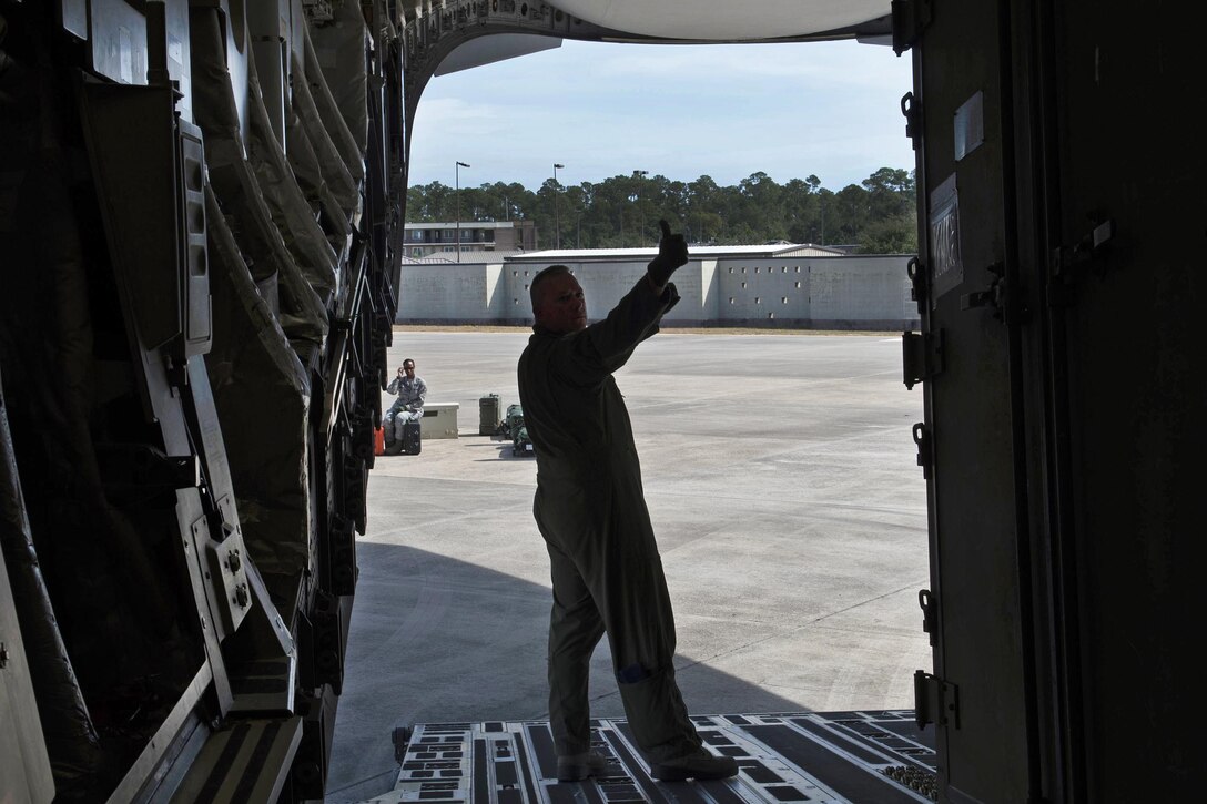Air Force Capt. William LaMountain waits for the signal to load the next simulated casualty during an aeromedical evacuation training scenario for Southern Strike 17 at the Gulfport Combat Readiness Training Center, Miss., Oct. 26, 2016. LaMountain is a flight nurse assigned to the 156th Aeromedical Evacuation Squadron. Air Force photo by Staff Sgt. Sean Martin