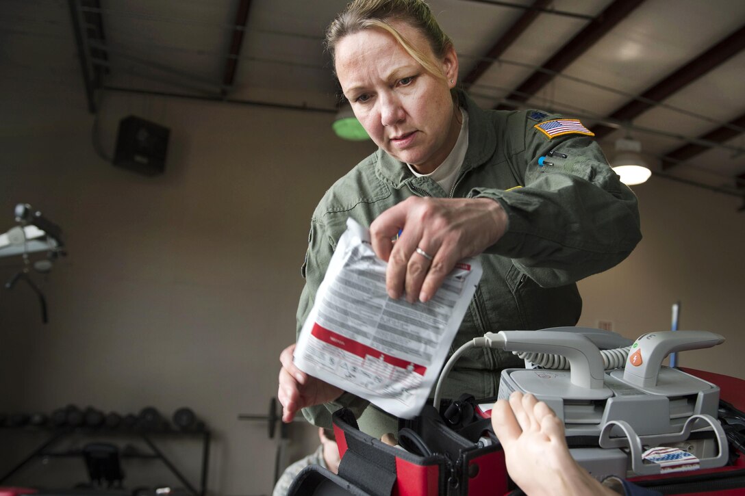 Air Force Lt. Col. Jenifer Monroe prepares a simulated casualty for transport during Southern Strike 17 at Camp Shelby Joint Forces Training Center, Miss., Oct. 26, 2016. Monroe is a critical care air transport team nurse assigned to the 446th Aeromedical Evacuation Squadron. Air Force photo by Staff Sgt. Sean Martin