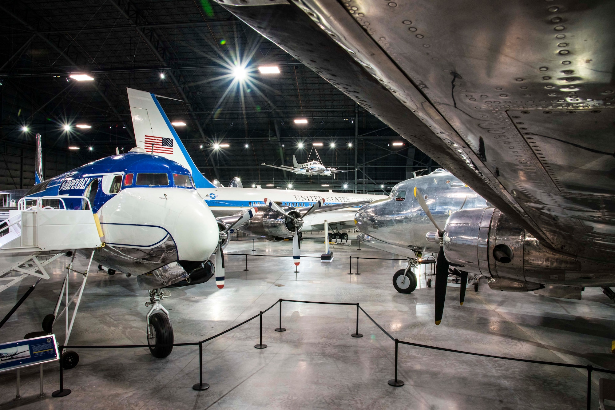 DAYTON, Ohio -- The Douglas VC-118 “Independence” and the Douglas VC-54C “Sacred Cow”  on display in the Presidential Gallery at the National Museum of the United States Air Force. (U.S. Air Force photo by Ken LaRock)
