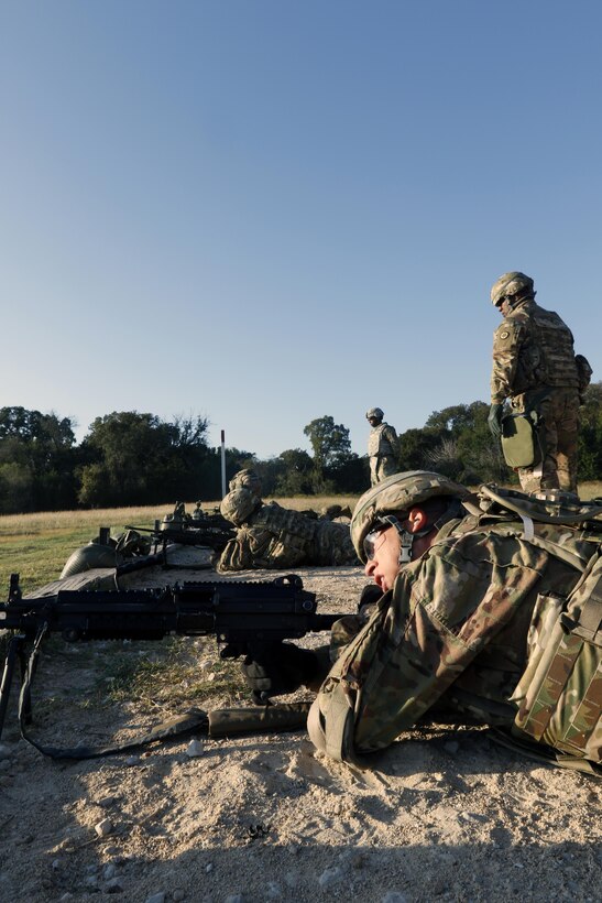 316th Sustainment Command (Expeditionary) Soldiers, fire the M249 Light Machine Gun at a III Corps and Fort Hood firing range Oct 26, 2016 at Fort Hood, Tx., as part of their pre-mobilization training. The 316th ESC is a Army Reserve unit from Coraopolis, Pa. (U.S. Army photo by Sgt. Christopher Bigelow)