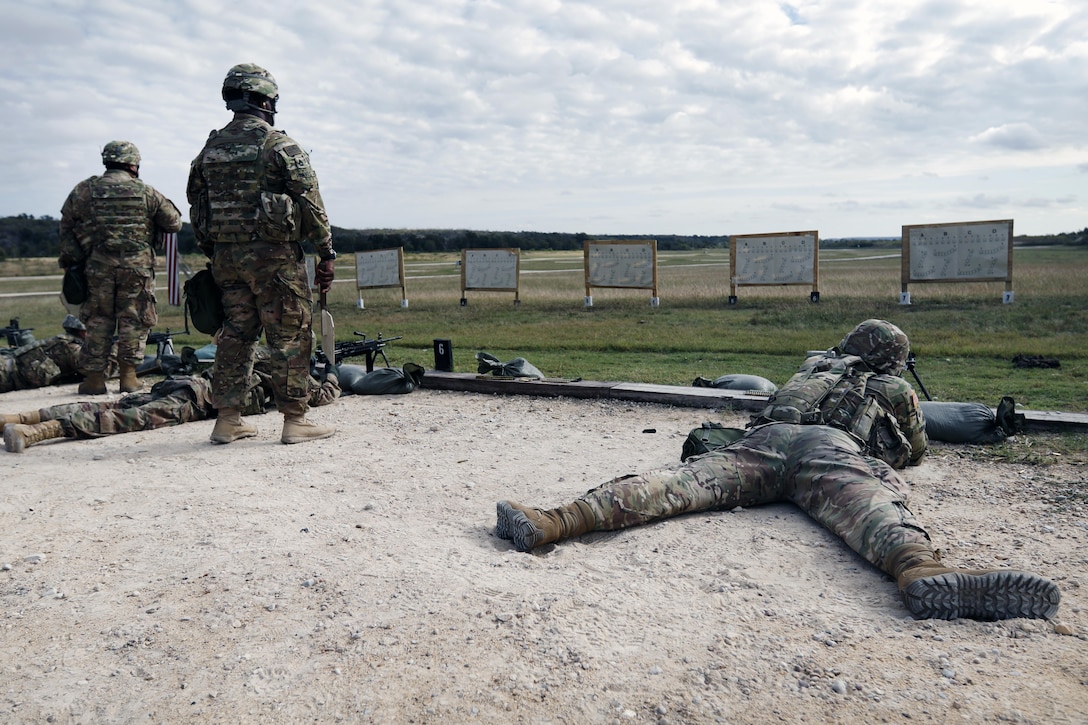 316th Sustainment Command (Expeditionary) Soldiers, fire the M249 Light Machine Gun at a III Corps and Fort Hood firing range Oct 26, 2016 at Fort Hood, Tx., as part of their pre-mobilization training. The 316th ESC is a Army Reserve unit from Coraopolis, Pa. (U.S. Army photo by Sgt. Christopher Bigelow)