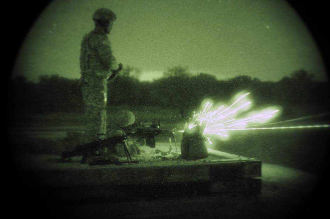 316th Sustainment Command (Expeditionary) Soldiers, fire the M249 Light Machine Gun at a III Corps and Fort Hood firing range Oct 26, 2016 at Fort Hood, Tx., as part of their pre-mobilization training. The 316th ESC is a Army Reserve unit from Coraopolis, Pa. (U.S. Army photo by Sgt. Christopher Bigelow)