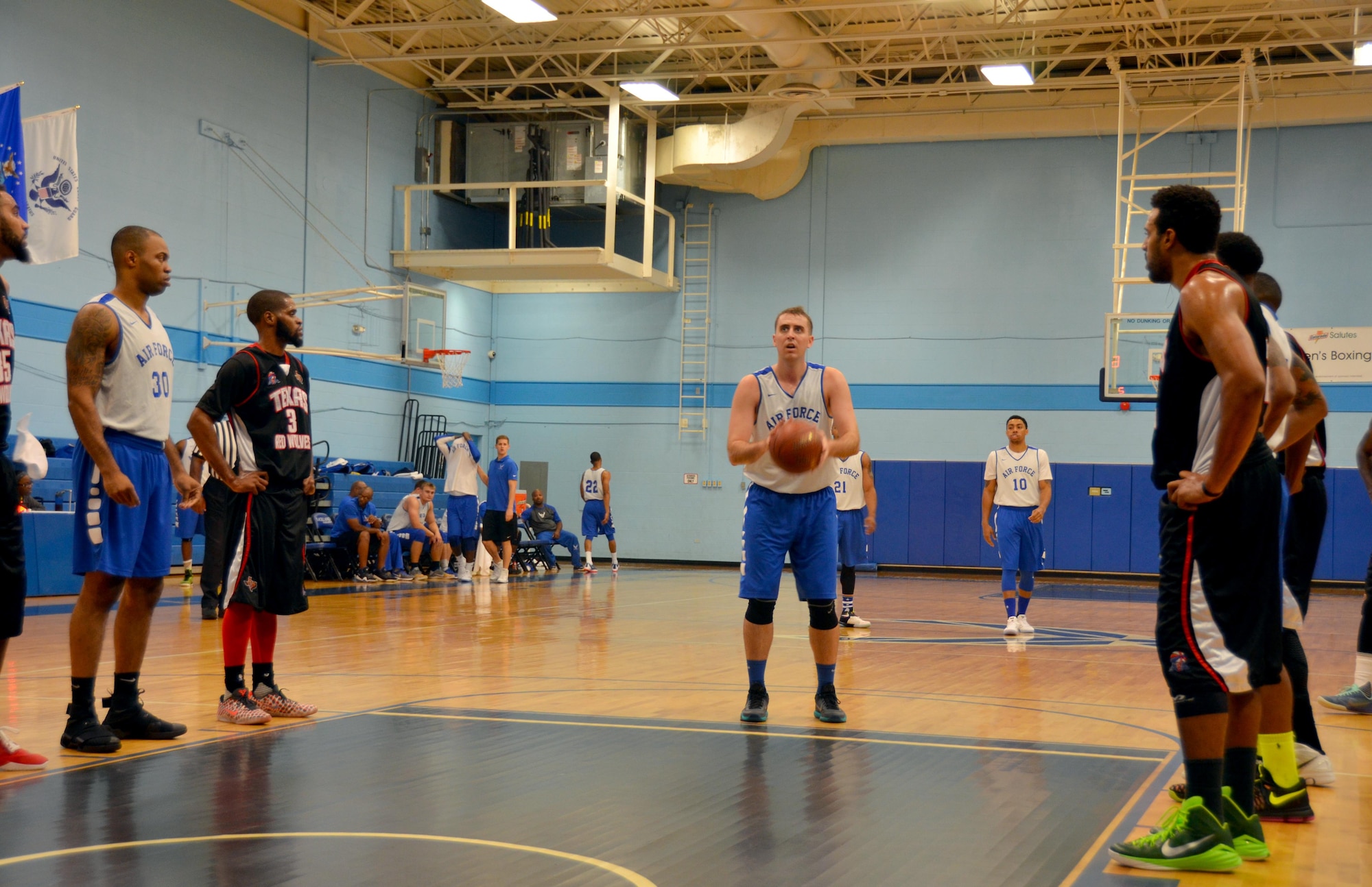 1st Lt. Michael Fitzgerald attempts to shoot a foul shot during the first half against the Texas Red Wolves at the Chaparral Fitness Center at JBSA-Lackland. (U.S. Air Force photo by Steve Warns)