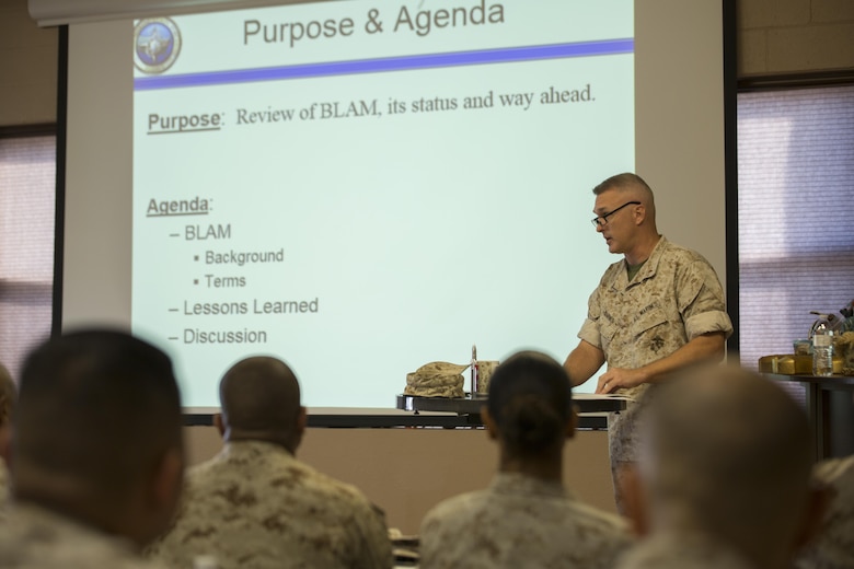 Chief Warrant Officer 4 Patrick M. Barnes, officer in charge, Admin Assist Unit, Marine Forces Reserve, gives a class on the new standardized administrative process being implemented across MARFORRES during the Battalion Level Administration Management initiative at the 2016 Senior Administrator Symposium aboard Naval Air Station Joint Reserve Base Belle Chasse, La., Oct. 12-13, 2016. The symposium utilized instruction and practical application to help senior administrative personnel understand how and why the implementation of the Battalion Level Administrative Management initiative will improve Reserve units’ ability to pass MCAAT inspections. The initiative will mitigate the issues with the current system. (U.S. Marine Corps photo by Sgt. Sara Graham) 
