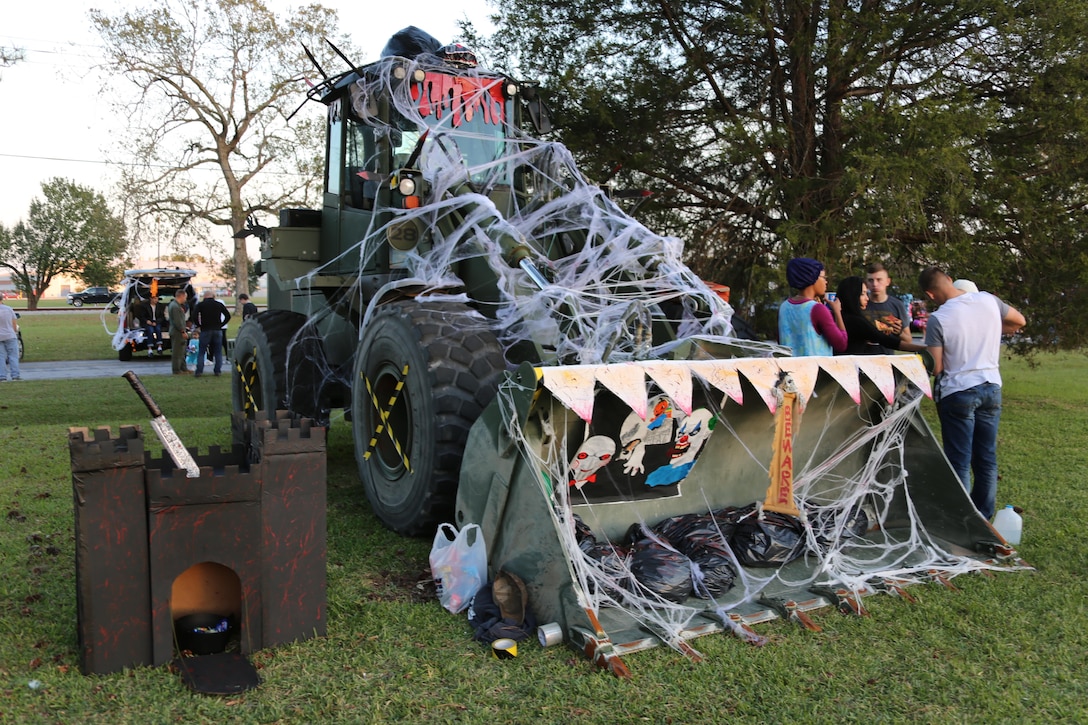 A truck is decorated with during a Trunk or Treat event aboard Marine Corps Air Station Cherry Point, N.C., Oct. 27, 2016. Marine Corps Community Services hosted the Halloween-inspired event that included face painting; touch the truck displays; and a family glow dance party. Decorated trunks were judged and the highest-rated contestants received door prizes. (U.S. Marine Corps photo by Cpl. Jason Jimenez/Released)