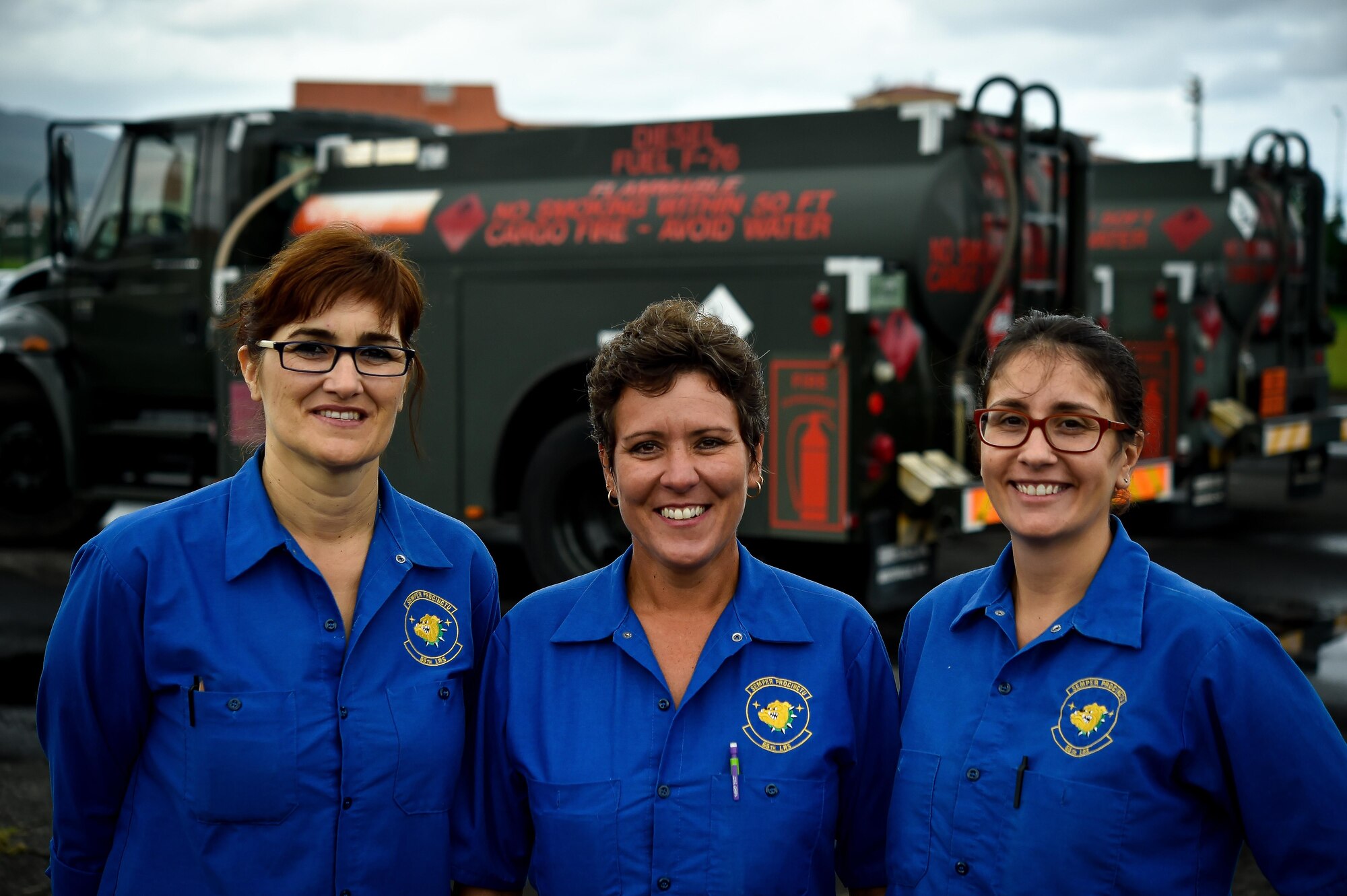 Portuguese fuels operators stand in front of a fuel truck at Lajes Field, Azores, Portugal, Oct. 5, 2016. Six hours away from its parent wing, at Ramstein Air Base, Germany, this geographically-separated unit is home to more than 600 Airmen including local nationals who serve there. (U.S. Air Force photo by Senior Airman Nicole Keim)