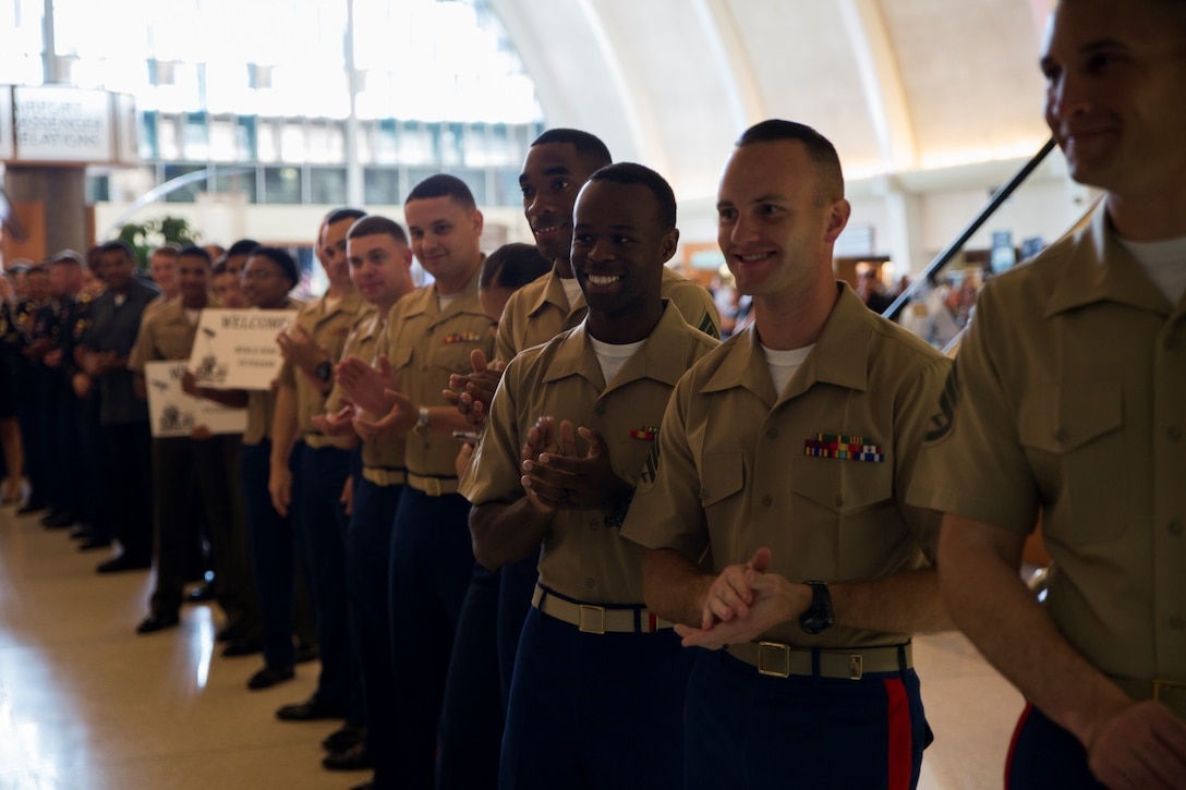 Marines from Marine Corps Support Facility New Orleans welcome World War II veterans as they arrive at Louis Armstrong New Orleans International Airport on a Soaring Valor Honor Flight, Oct. 27, 2016. Soaring Valor Honor Flight is a program provided by the Gary Sinise Foundation and gives World War II veterans the opportunity to tour The National WWII Museum and preserve each veteran’s oral history. (U.S. Marine Corps photo by Cpl. Melissa Martens/ Released) 