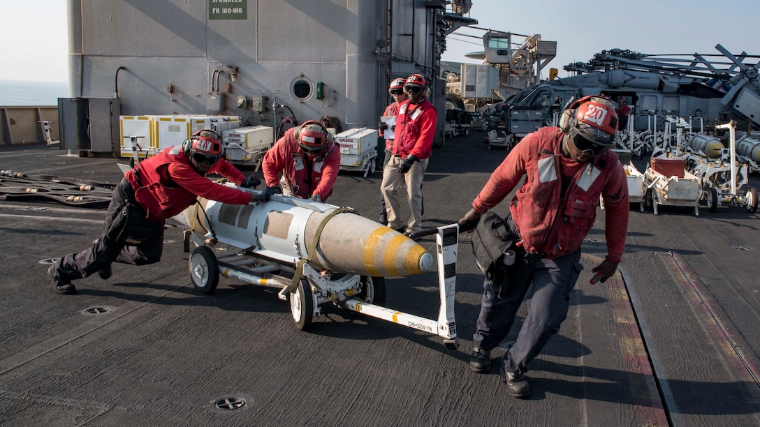 161027-N-WC455-219

ARABIAN GULF (Oct. 27, 2016) Sailors transport ordnance on the flight deck of the aircraft carrier USS Dwight D. Eisenhower (CVN 69) (Ike). Ike and its Carrier Strike Group are deployed in support of Operation Inherent Resolve, maritime security operations and theater security cooperation efforts in the U.S. 5th Fleet area of operations. (U.S. Navy photo by Seaman Joshua Murray)