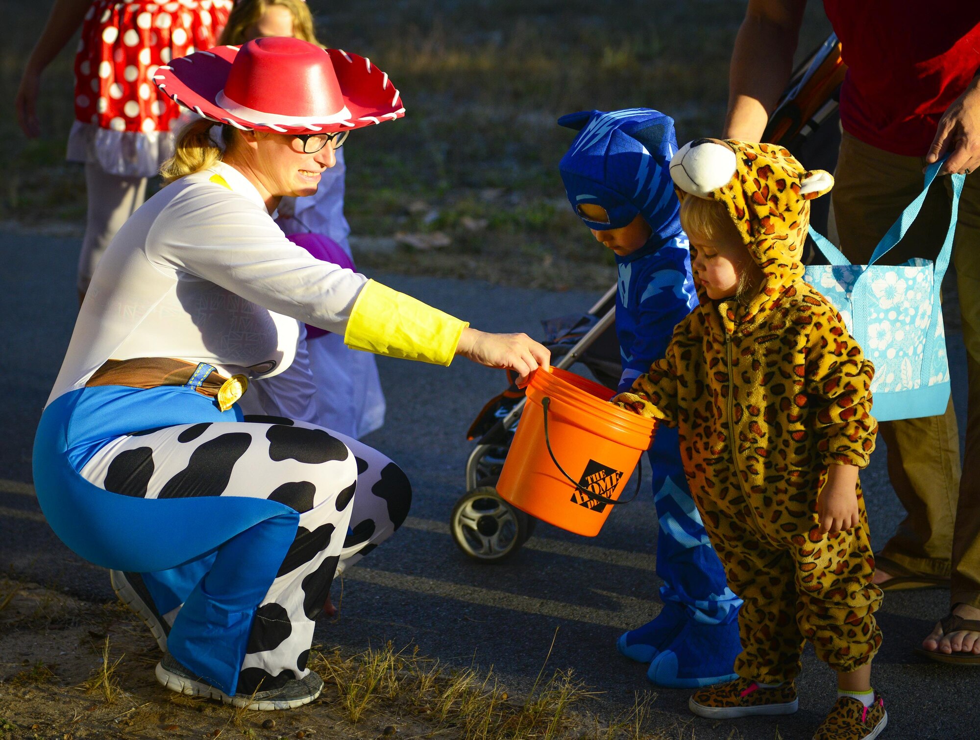 Tricks and treats were passed out frequently during the base’s annual Trunk or Treat event Oct. 28 at Eglin Air Force Base, Fla.  More than 200 parents and children dressed up for the trick or treat event that showcased games and other activities.  (U.S. Air Force photo/Jasmine Porterfield)