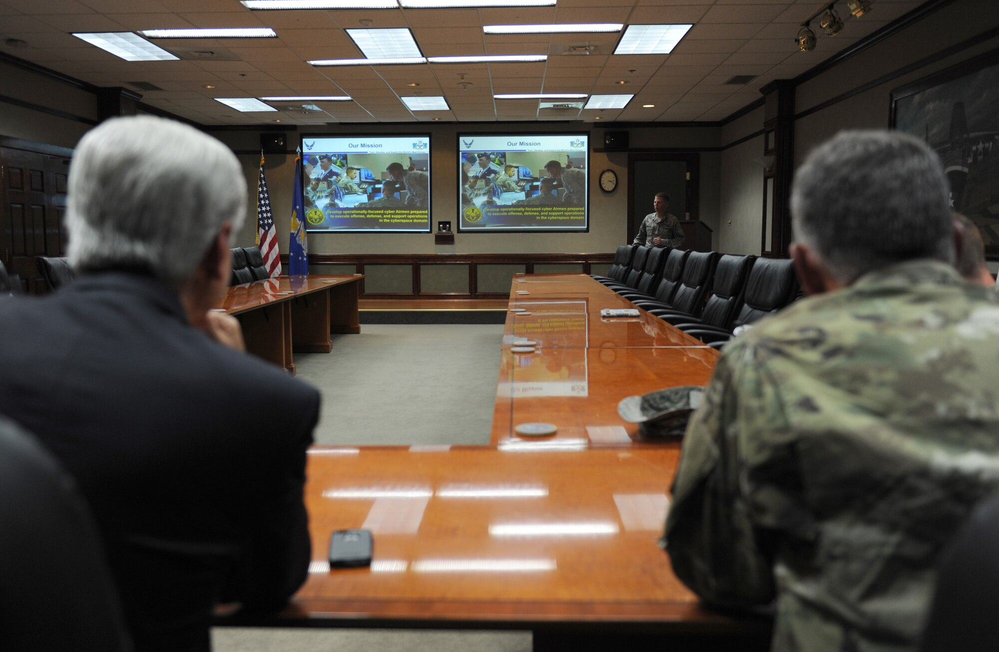 Mississippi Governor Phil Bryant and U.S. Army Maj. Gen. Janson Boyles, Adjutant General of Mississippi, Mississippi National Guard, receive a 333rd Training Squadron mission briefing at Stennis Hall Oct. 25, 2016, on Keesler Air Force Base, Miss. During his visit at Keesler, Bryant also received a windshield tour of the new entry gate project. (U.S. Air Force photo by Kemberly Groue/Released)