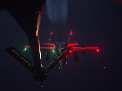 A U.S. Air Force KC-135 Stratotanker flown by the 912th Air Refueling Squadron from March Air Force Base, Calif., provides refueling capabilities to Royal Canadian Air Force CF-18s while both units participate in the Vigilant Shield 2017 Field Training Exercise 20 Oct., 2016, in the high arctic.

VS17 is an annual exercise sponsored by The North American Aerospace Defense Command and led by Alaskan NORAD Region, in conjunction with Canadian NORAD Region and Continental NORAD Region, who undertake field training exercises aimed at improving operational capability in a bi-national environment.

This year’s exercise sees NORAD building on previous years’ training successes when deploying air assets and personnel to the far north to exercise sovereignty operations in North America’s northern aerospace and in the high Arctic. This exercise provides crucial training opportunities for numerous military personnel with a variety of aircraft and assets from Canada and the United States to improve interoperability and to demonstrate NORAD’s ability to defend North America. (U.S. Air Force Photo by Tech. Sgt. Gregory Brook)