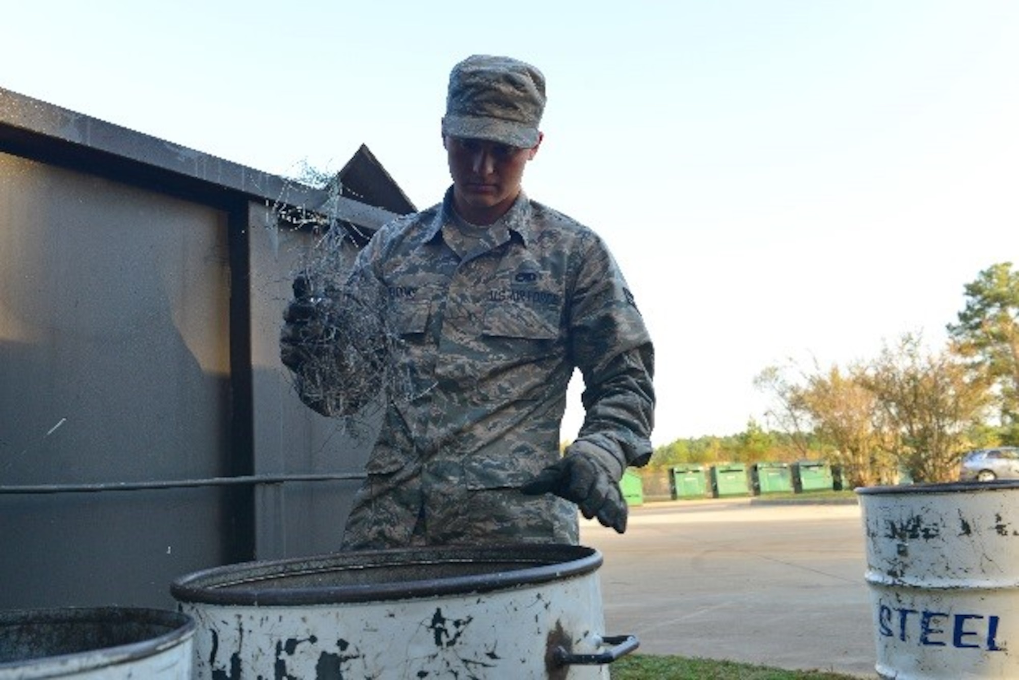 U.S. Air Force Airman 1st Class Daniel Meadows, 20th Equipment Maintenance Squadron aircraft structural maintenance apprentice, sorts through a bin full of metals at Shaw Air Force Base, S.C., Oct. 28, 2016. The Shaw Recycling Center accepts a variety of materials including plastic bottles and jugs, but does not accept other plastic items. (U.S. Air Force photo by Airman 1st Class Destinee Sweeney)