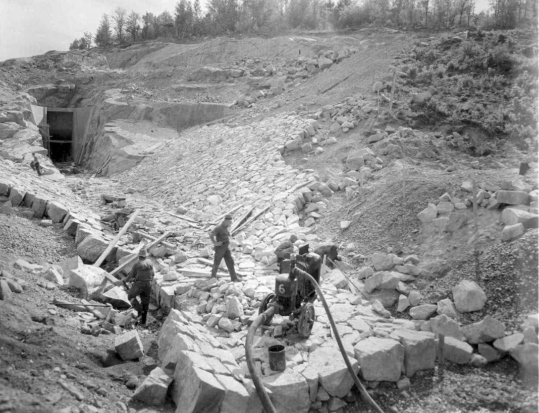 Contractors perform work constructing the Surry Mountain Dam in Surry, New Hamphsire in this October 1941 photo.