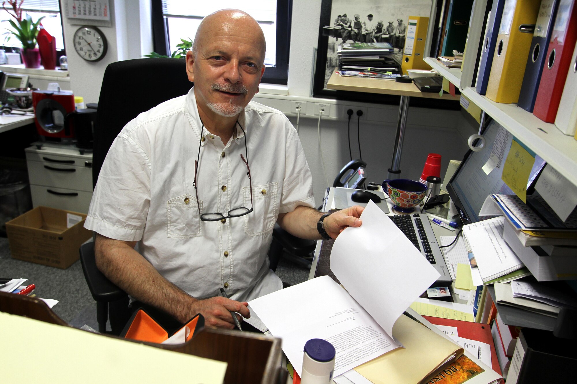 Karl Willi Ningelgen, AFCEC's Europe senior environmental advisor, takes a moment for a photo in his office on Ramstein AB, Germany. (U.S. Air Force photo/Debbie Aragon)
