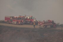 Firefighters with the Camp Pendleton Fire department fight a wild fire on Camp Pendleton, Calif., Sept 28, 2016. U.S Marine Corps photo by LCpl Samuel Brusseau