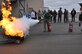 Chadwick McIntosh from the 910th Financial Management office uses a fire extinguisher on a controlled fire during fire safety training Oct. 13, 2016, here. Fire safety training is an annual requirement for members of Youngstown Air Reserve Station. (U.S. Air Force photo/Maj. Polly Orcutt)