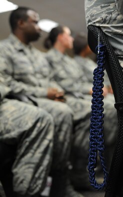 A blue rope hangs on a chair during a graduation ceremony at Lott Hall Feb. 11, 2016, Keesler Air Force Base, Miss. The first selected group of NCOs graduated the military training leader course after attending the nine-day class at Keesler. The program, formerly based out of Joint Base San Antonio-Lackland, Texas, is designed to mentor, train and lead Airmen in technical training as military training leaders. (U.S. Air Force photo by Kemberly Groue)