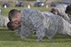 A cadet does push ups during the Combat Fitness Challenge portion of the Commandant's Challenge, Oct. 28, 2016, at the U.S. Air Force Academy. The Commandant's Challenge is a physically and mentally demanding 48-hour training exercise and contest between the Cadet Wing’s 40 cadet squadrons. (U.S. Air Force photo/Jason Gutierrez) 