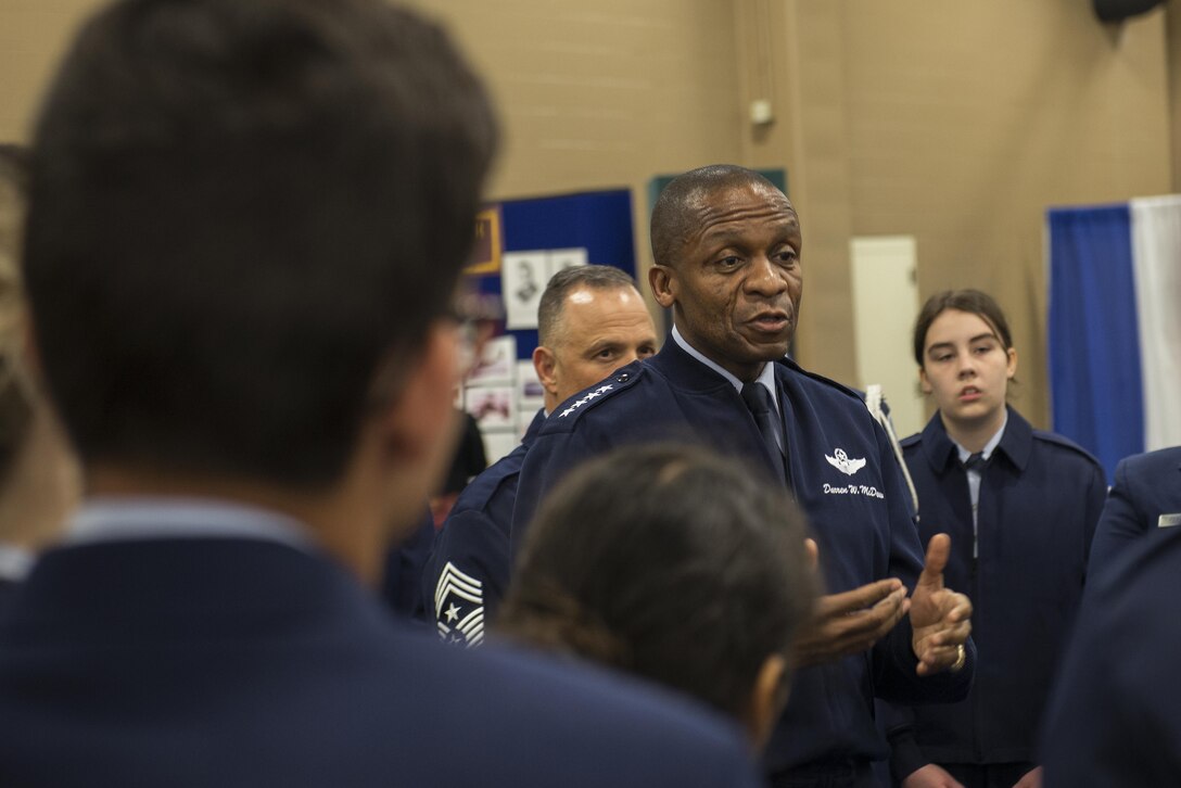 Gen. Darren W. McDew, U.S. Transportation Command commander, speaks with Junior Air Force Reserve Officer Training Corps cadets during the 48th Airlift/Tanker Association Symposium in Nashville, Tenn., Oct. 27, 2016. The symposium served as a key professional development forum for mobility Air Forces Airmen by enabling direct access to senior mobility leaders and fostering an environment encouraging open dialogue and honest discussions. (U.S. Air Force photo by Senior Airman Megan Friedl) 
