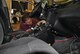 A mechanic with the 502nd Logistics Readiness Squadron at Joint Base San Antonio-Fort Sam Houston installs one of the idle-reduction systems being tested on security forces vehicles. (U.S. Air Force photo by Carole Chiles Fuller)