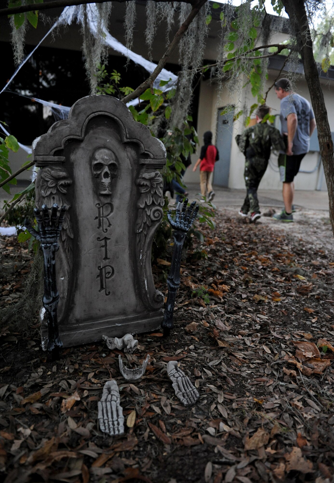 Props sit outside of the haunted house at Ghouls in the Park at Marina Park Oct. 28, 2016, on Keesler Air Force Base, Miss. Ghouls in the Park also featured a zombie bus, “Trunk or Treat” and games for children of all ages. (U.S. Air Force photo by Kemberly Groue/Released)
