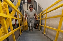 Airman 1st Class Mickel Roe Villar, 91st Missile Maintenance Squadron facilities maintenance technician, carries pelican cases to the equipment storage area at Minot Air Force Base, N.D., Oct. 24, 2016. The FMS Airmen are responsible for dispatching all equipment sent to missile alert and launch facilities. (U.S. Air Force photo/Airman 1st Class Jonathan McElderry)