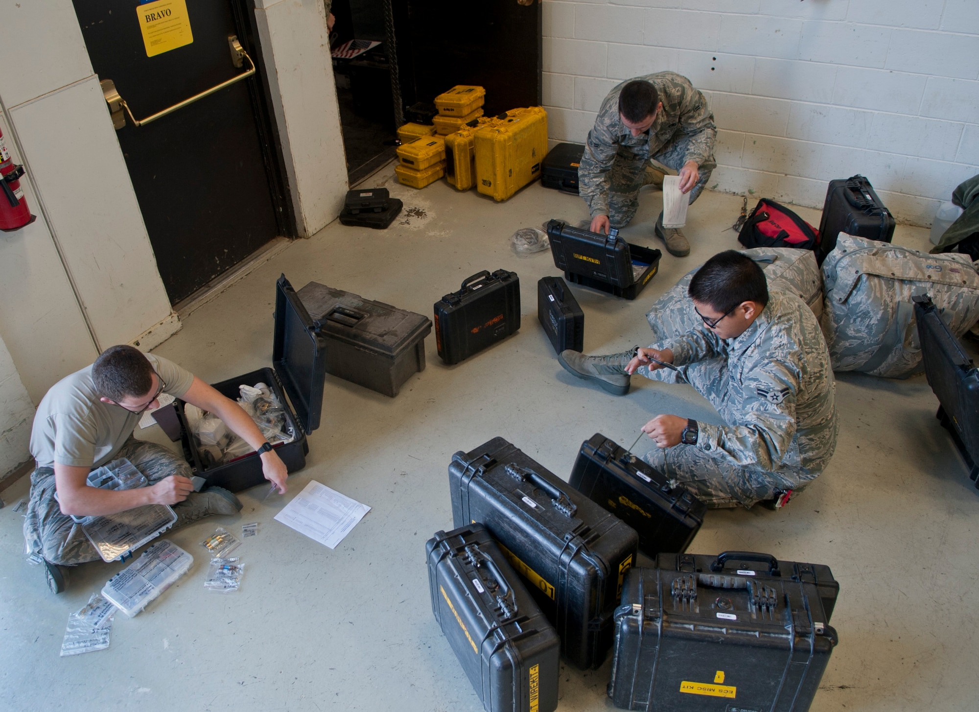 Airmen with the 91st Missile Maintenance Squadron facilities maintenance section, check fuel kits at Minot Air Force Base, N.D., Oct. 24, 2016. The FMS Airmen are responsible for keeping track of all equipment used on missile alert and launch facilities. (U.S. Air Force photo/Airman 1st Class Jonathan McElderry)