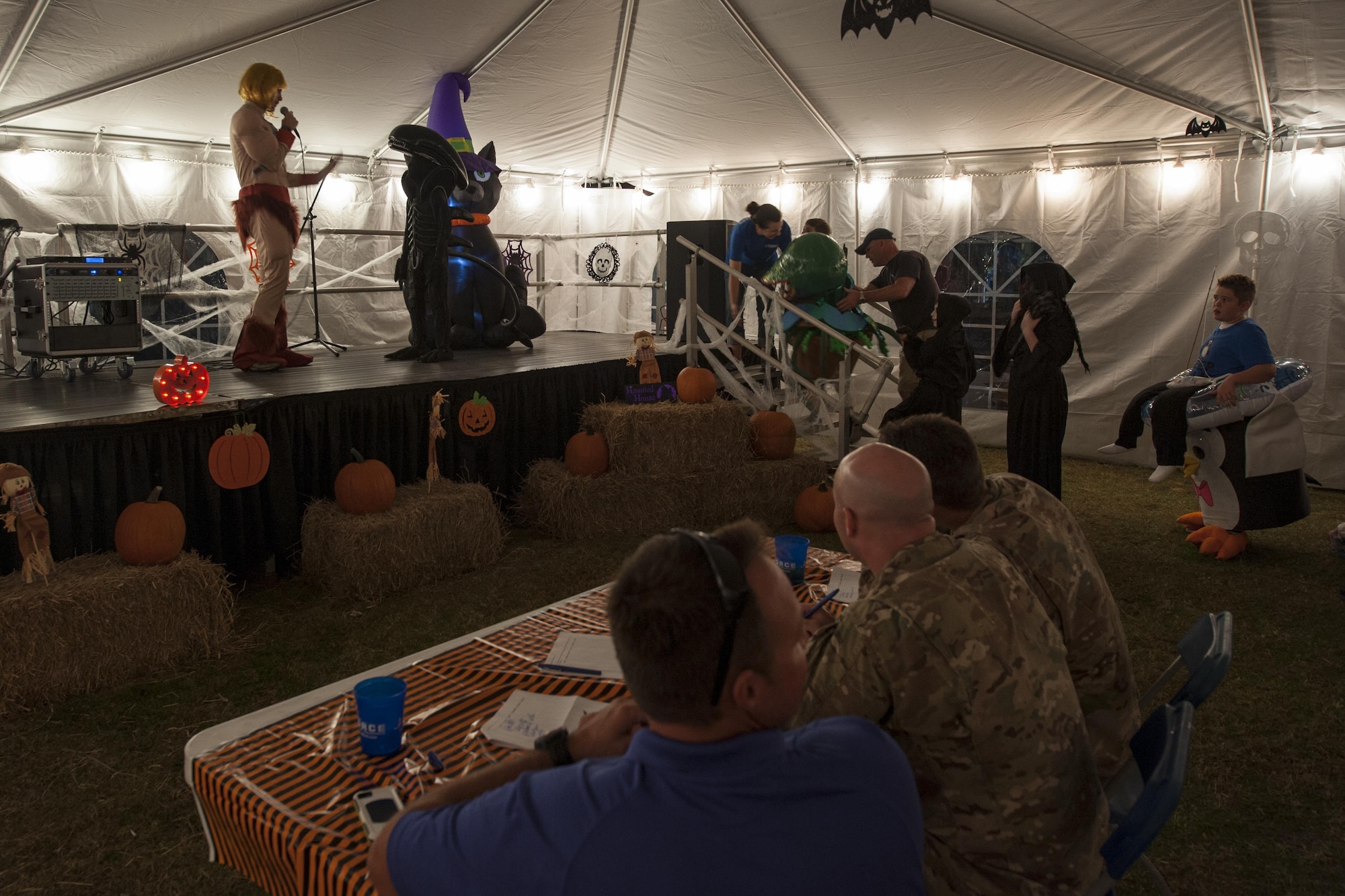 Air Commandos and families participate in a costume contest during the Haunted Lakes Fall Festival at Gator Lakes Golf Course on Hurlburt Field, Fla., Oct. 28, 2016. The costume contest was judged by the 1st Special Operations Wing leadership and included three categories: adult, youth and pet. (U.S. Air Force photo by Airman 1st Class Joseph Pick)