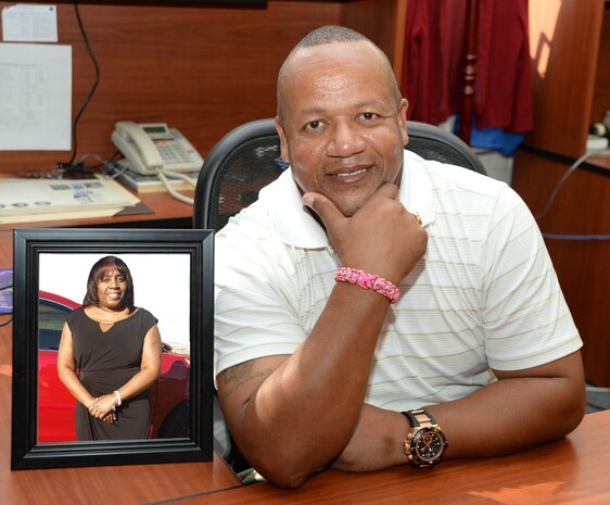 Wearing a “Think-Pink” camouflage wristband in observance of Breast Cancer Awareness Month, Anthony Wade, operations and plans specialist, Operations and Training Division, Marine Corps Logistics Base Albany, recently, honors “a close friend,” Melissa Jefferson of Columbus, Ga. Jefferson (pictured left), who was recently diagnosed with breast cancer, survived a double mastectomy and is currently cancer-free.
