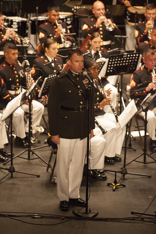 Chief Warrant Officer 3 Michael J. Smith, band officer of Marine Corps Band New Orleans, sings at the Ponce La Perla Theater before a concert to celebrate the Marine Corps Reserve Centennial in Puerto Rico on Oct. 17, 2016. Marine Forces Reserve is commemorating 100 years of rich history, heritage, espirit-de-corps across the U.S. The Centennial celebration recognizes the Reserve's essential role as a crisis response force and expeditionary force in readiness, constantly preparing to augment the active component. (U.S. Marine photo by LCpl. Ricardo Davila/ Released)