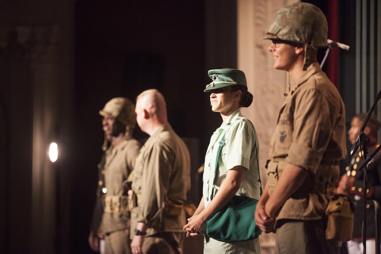 Corporal David Linnenkamp, and Sgt. Sara Graham stand by with fellow actors from Marine Corps Band New Orleans, during a concert to celebrate the Marine Corps Reserve Centennial La Perla Theater in Puerto Rico on Oct. 17, 2016. Marine Forces Reserve is commemorating 100 years of rich history, heritage, espirit-de-corps across the U.S. The Centennial celebration recognizes the Reserve's essential role as a crisis response force and expeditionary force in readiness, constantly preparing to augment the active component. (U.S. Marine photo by LCpl. Ricardo Davila/ Released)