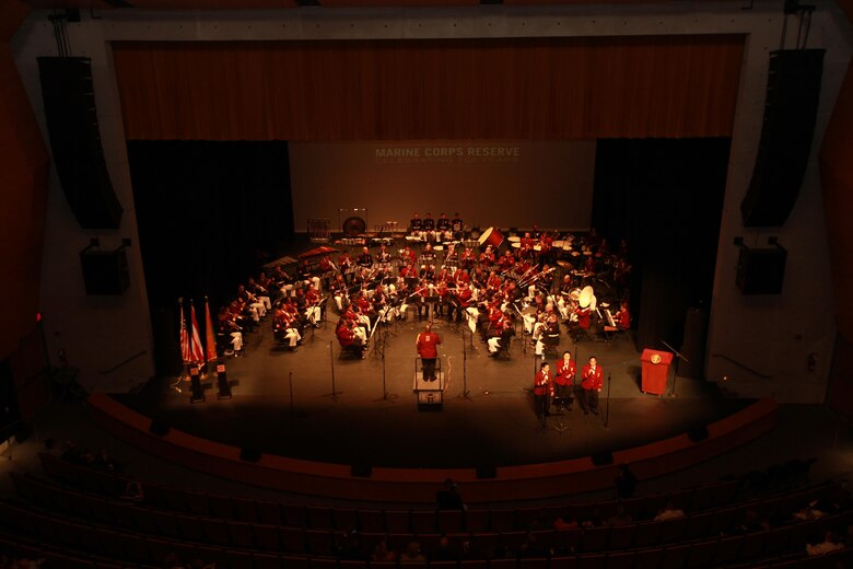 Marine Corps Band New Orleans and the Municipal Band of Humacao perform for the local residents and distinguished guest during the Marine Forces Reserve Centennial Celebration concert at the Centro De Bellas Artes in Humacao, Puerto Rico, Oct. 19, 2016. Marine Forces Reserve is commemorating 100 years of rich history, heritage, Espirit-de-corps across the U.S. This celebration recognizes the Reserve's essential role as a crisis response force and expeditionary force in readiness, constantly preparing to augment the active component. (U.S. Marine photo by Master Sgt. John A. Lee, II / Released)
