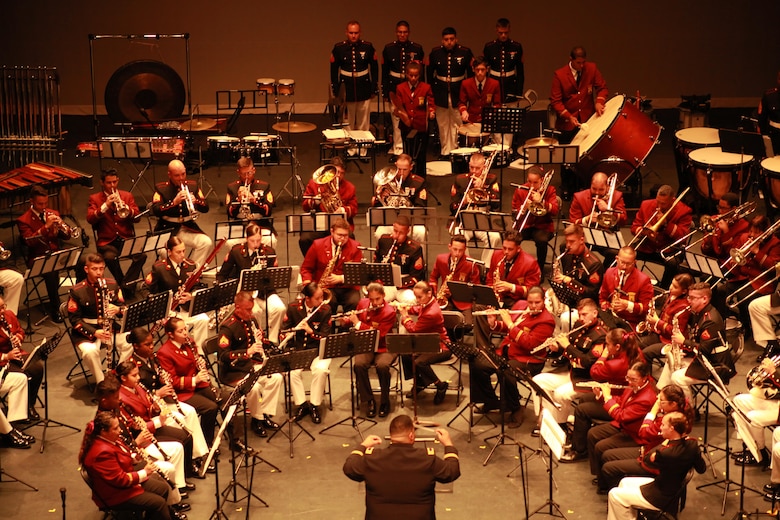 Marine Corps Band New Orleans and the Municipal Band of Humacao perform for the local residents and distinguished guest during the Marine Forces Reserve Centennial Celebration concert at the Centro De Bellas Artes in Humacao, Puerto Rico, Oct. 19, 2016. Marine Forces Reserve is commemorating 100 years of rich history, heritage, Espirit-de-corps across the U.S. This celebration recognizes the Reserve's essential role as a crisis response force and expeditionary force in readiness, constantly preparing to augment the active component. (U.S. Marine photo by Master Sgt. John A. Lee, II / Released)