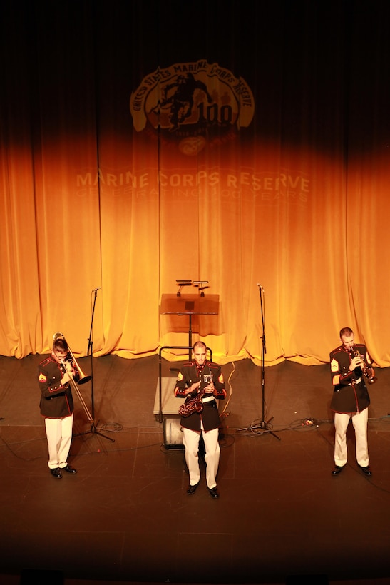 (From Left to Right) Cpl David Linnenkanp, SSgt. Mark Pellon, and Master Sgt. Timothy Otis from Marine Corps Band New Orleans perform a jazz ensemble for the local residents and distinguished guest during the Marine Forces Reserve Centennial Celebration concert at the Centro De Bellas Artes in Humacao, Puerto Rico, Oct 19, 2016. The Marine Forces Reserve is commemorating 100 years of rich history, heritage, Espirit-de-corps across the U.S. This celebration recognizes the Reserve's essential role as a crisis response force and expeditionary force in readiness, constantly preparing to augment the active component. (U.S. Marine photo by Master Sgt. John A. Lee, II / Released)