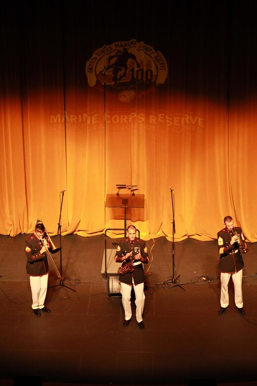 (From Left to Right) Cpl David Linnenkanp, SSgt. Mark Pellon, and Master Sgt. Timothy Otis from Marine Corps Band New Orleans perform a jazz ensemble for the local residents and distinguished guest during the Marine Forces Reserve Centennial Celebration concert at the Centro De Bellas Artes in Humacao, Puerto Rico, Oct 19, 2016. The Marine Forces Reserve is commemorating 100 years of rich history, heritage, Espirit-de-corps across the U.S. This celebration recognizes the Reserve's essential role as a crisis response force and expeditionary force in readiness, constantly preparing to augment the active component. (U.S. Marine photo by Master Sgt. John A. Lee, II / Released)