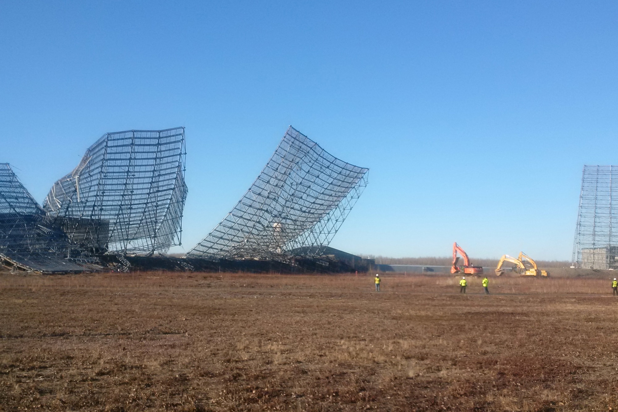 CLEAR AIR FORCE STATION, Alaska – A crew watches as cables are attached to the Ballistic Missile Early Warning System radar before demolition at Clear Air Force Station, Alaska, Oct. 18, 2016.  The radar was taken down and is being removed and recycled to make way for new construction. (Courtesy photo)