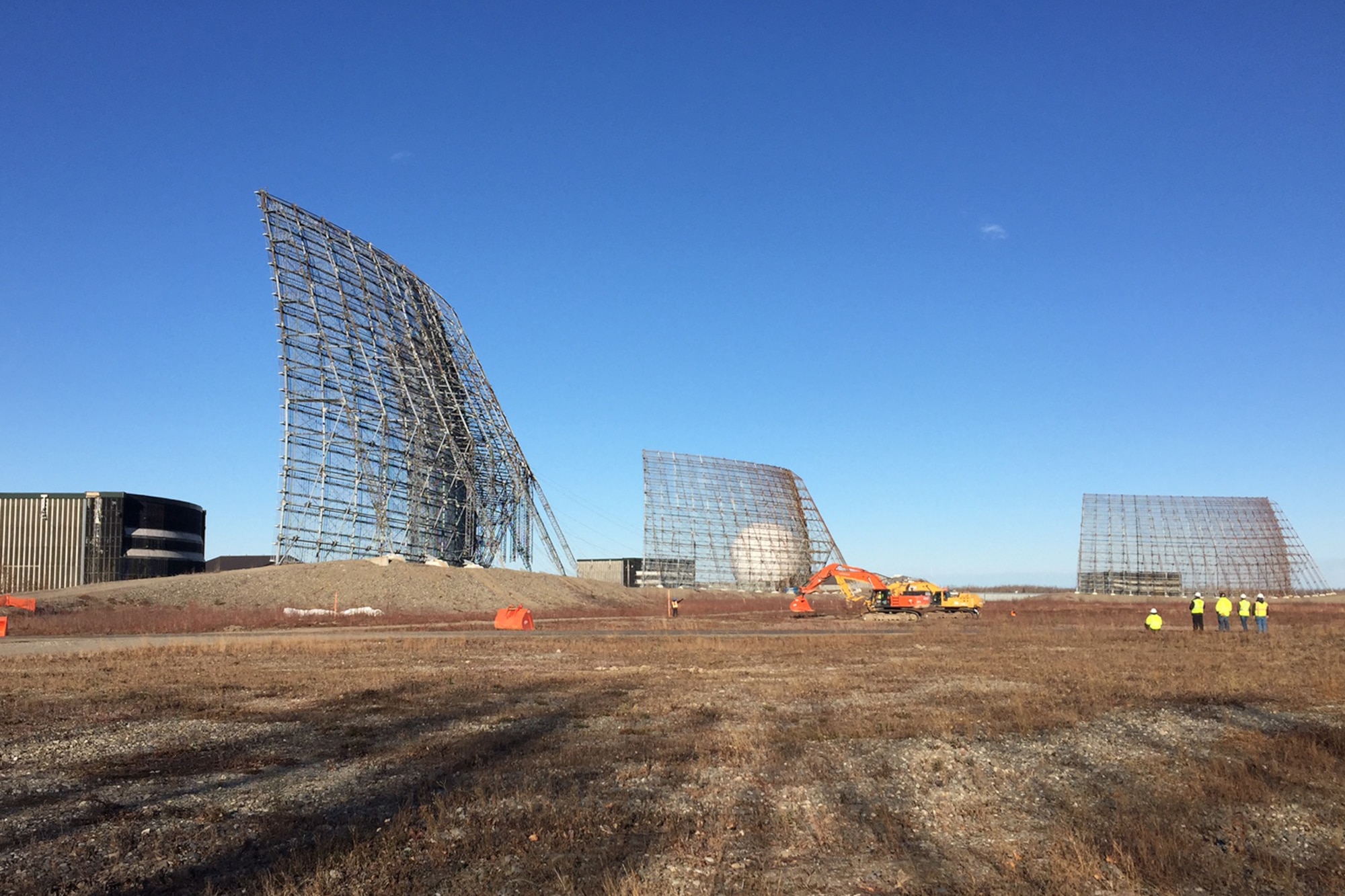 CLEAR AIR FORCE STATION, Alaska – A crew watches as cables are attached to the Ballistic Missile Early Warning System radar before demolition at Clear Air Force Station, Alaska, Oct. 18, 2016.  The radar was taken down and is being removed and recycled to make way for new construction. (Courtesy photo)