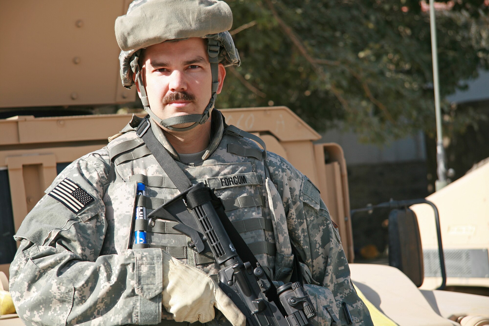 Then Maj. Craig Forcum, now 341st Medical Group commander, gets ready to go out on a convoy October 2007, near Camp Eggers in Kabul, Afghanistan. Forcum has been deployed to Afghanistan, Germany and Kyrgyzstan, and has traveled to more than 35 countries. Some of his assignments include Royal Air Force Lakenheath, England; Joint Base Pearl Harbor-Hickam, Hawaii, and Kadena Air Base, Japan. (Courtesy photo)