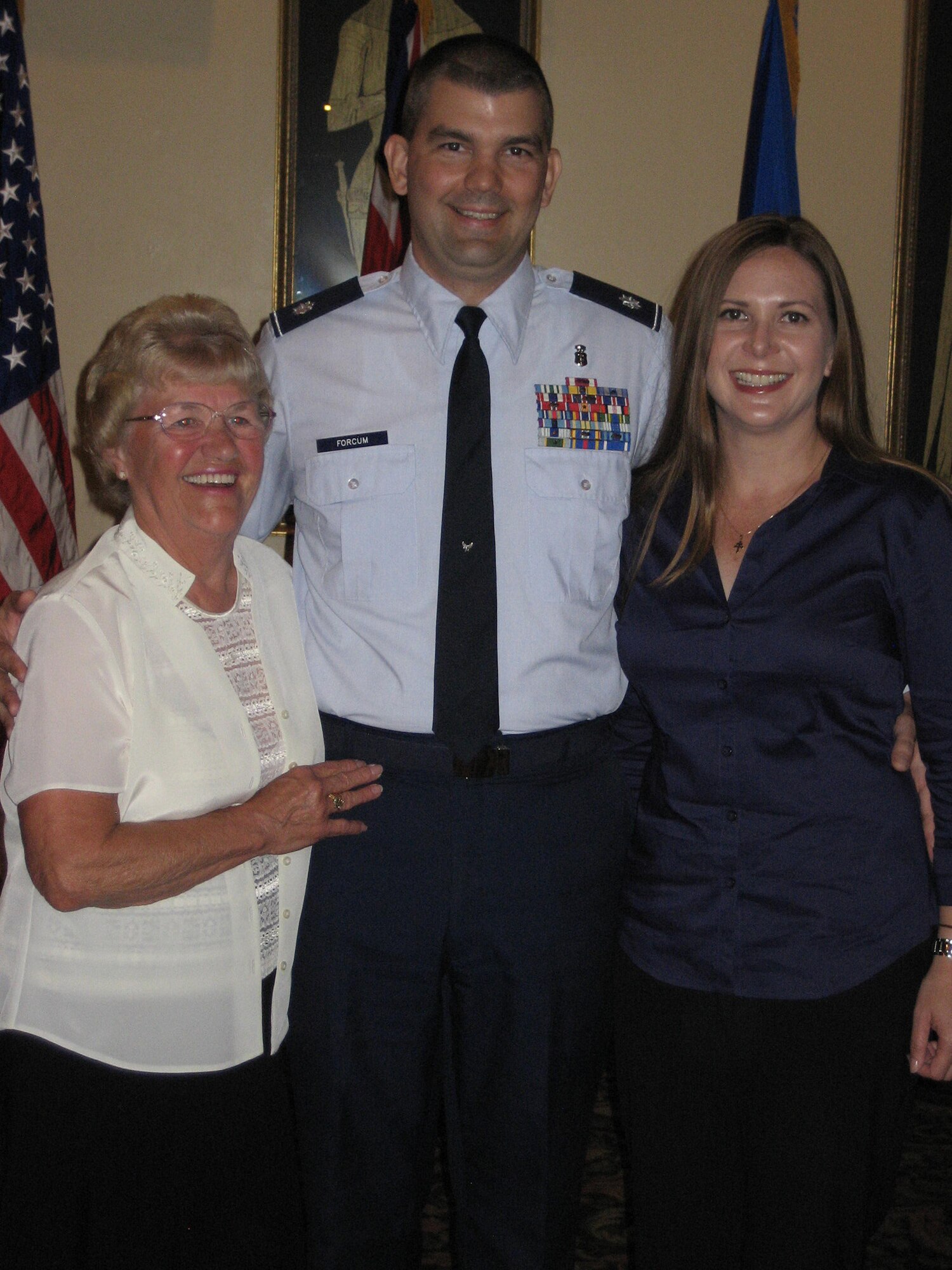 Then Lt. Col. Craig Forcum, center, with his wife Sandi, right, and aunt Doris, during a promotion ceremony in September 2009 at Royal Air Force Lakenheath, England. Forcum took command of the 341st Medical Group on July 7, 2016. (Courtesy photo)